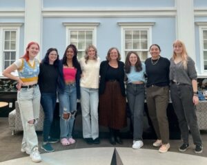 A photo taken in TCNJ's Social Science Building of the Fall 2023 lab members and professor. 